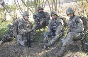 Soldiers from 1st The Queen's Dragoon Guards working alongside Afghan National Army colleagues in Nad 'Ali