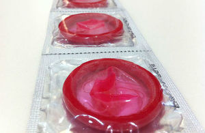 Packets of red condoms.