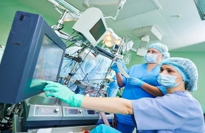 surgical staff looking at hospital equipment