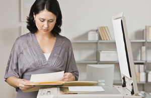 Woman making photocopies