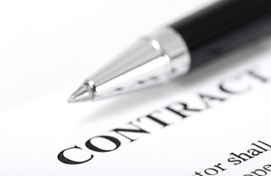 close up of a pen on top of a contract