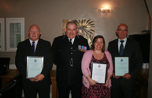 ACC Armitt presents the employees with their commendations