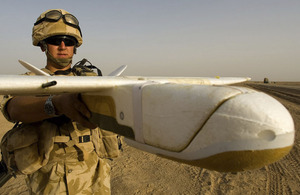 A soldier prepares to launch a Desert Hawk at Camp Bastion (stock image)