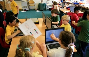 A group of primary school pupils in a classroom