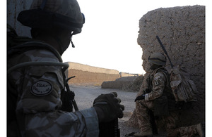 Soldiers prepare to leave the security of their compound