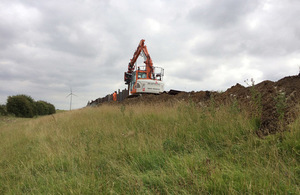 Machine on a flood bank