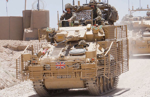 Members of the Light Dragoons, providing overwatch for ground forces, push forward on a scouting mission