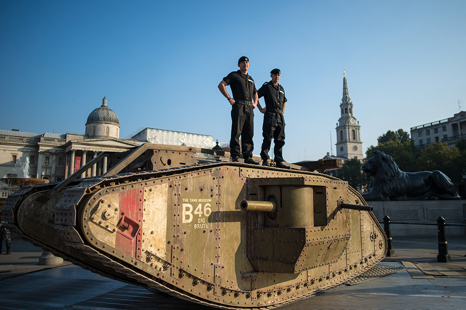 A British First World War tank displayed in Trafalgar Square with members of the Royal Tank Regiment.