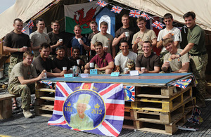 British servicemen enjoy their Fortnum and Mason Diamond Jubilee tea and biscuits