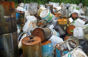 Stacked tins of cooking oil (credit: Environment Agency)