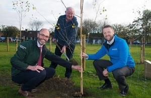 Image shows Phil Welton, Paul Davison and parish councillor Derrick Phillipson planting a tree