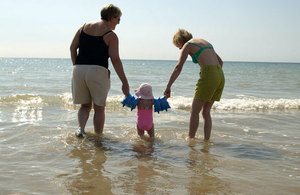 Family members enjoying clean bathing water at the seaside