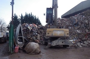 A picture showing the pile of waste at site.