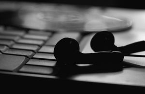 cd on a laptop keyboard, back lit