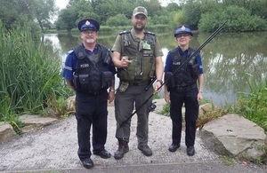 An Environment Agency Fishery Enforcement Officer and 2 PCSO's.