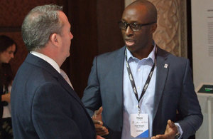 One of the mission entrepreneurs, Fredi Nonyelu of Briteyellow, discusses his business ideas with International Trade Secretary, Dr Liam Fox.
