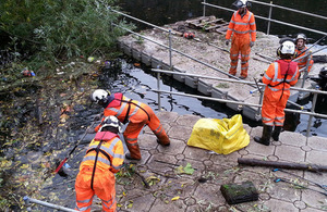 Workers on a floating platform