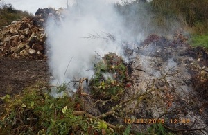 An illegal waste fire