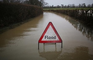 Image shows a flooded road