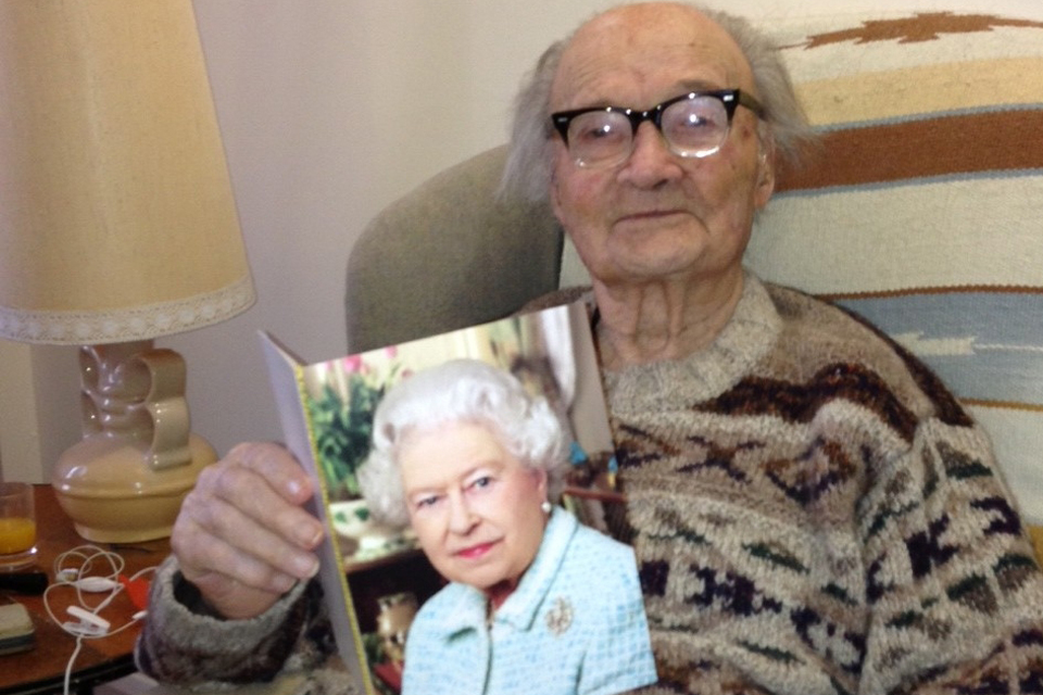 Mieczyslaw Juny with his birthday card from Her Majesty The Queen