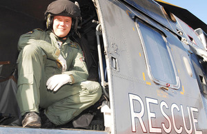 Petty Officer Airman 'Cags' Lacy inside a Search and Rescue helicopter [Picture: Petty Officer Airman (Photographer) Dave Gallagher, Crown Copyright/MOD 2010]
