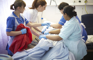 Group of nurses treating a patient
