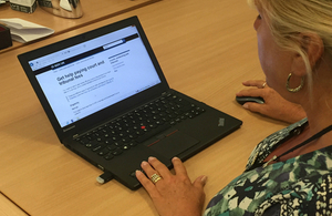 woman using laptop