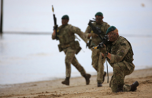 Royal Marines performing a beach assault. Crown copyright.