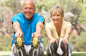 Man and women exercising