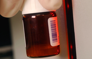 A pill bottle being scanned