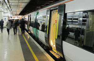 Train and passengers at Victoria Station.