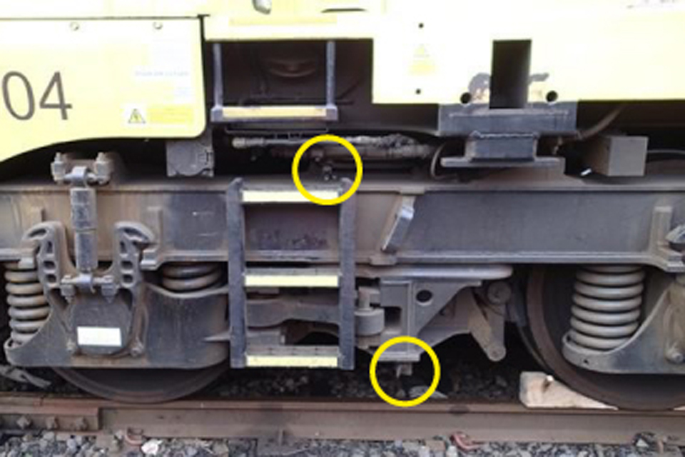 Location of parking brake isolation handle (circled bottom) and bogie brake isolation valve (circled top)