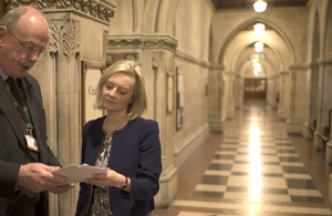 Elizabeth Truss with court staff