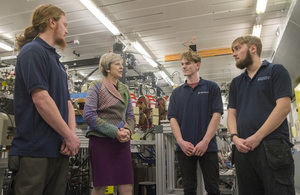 Prime Minister Theresa May speaking with young workers at Sci-Tech in Daresbury.