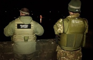 Image shows fisheries officers on patrol