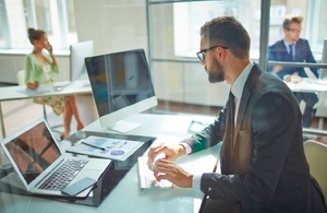 Generic picture of a man working on a laptop