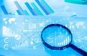 Magnifying glass analysing data