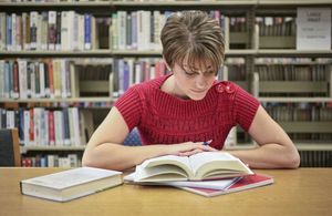 Woman studying in a library