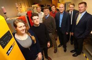Group of KTP partners in semi-circle, with Associates in the foreground.