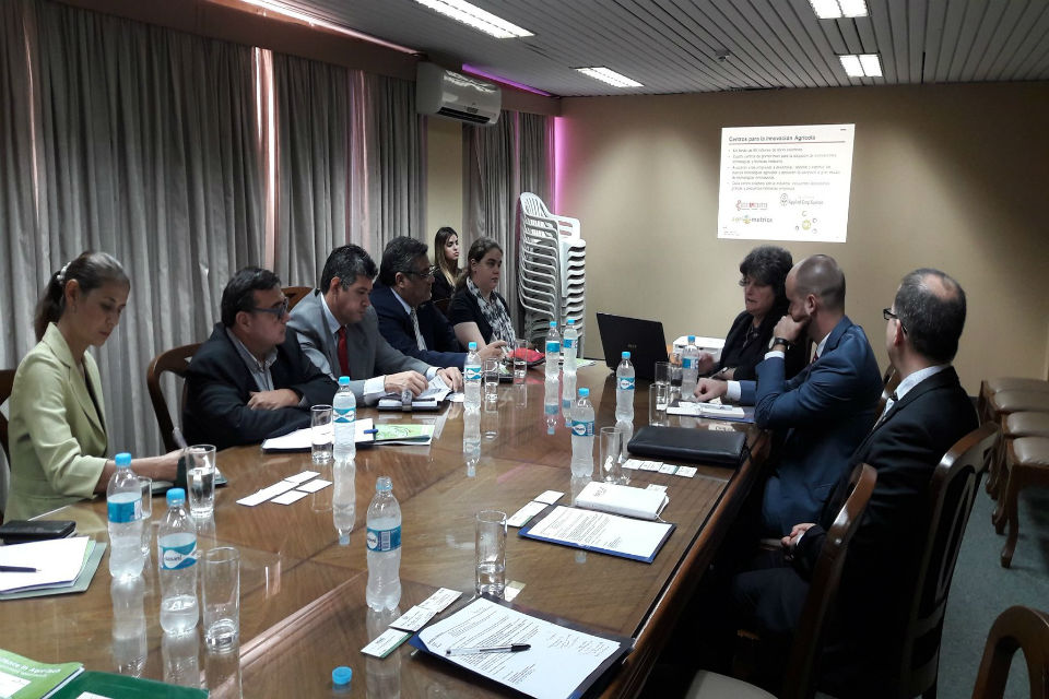 DIT experts giving a presentation to Paraguayan government officials