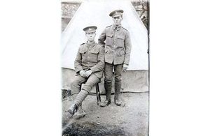 Pte Reuben Kimberley seated with comrade, Crown Copyright, All rights reserved