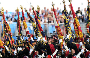 The new Colours of The Royal Regiment of Scotland are unfurled for the first time at Holyrood Park, Edinburgh [Picture: Mark Owens, Crown Copyright/MOD 2011]