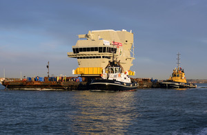 The forward island section of HMS Queen Elizabeth leaves Portsmouth Naval Base [Picture: Leading Airman (Photographer) Dave Jenkins, Crown Copyright/MOD 2013]