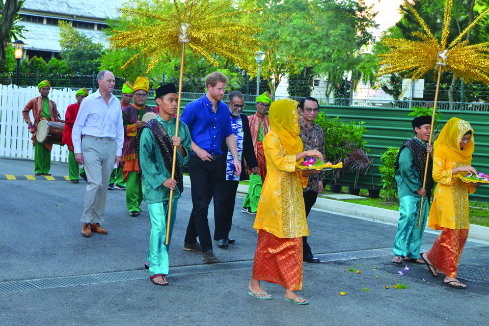Receiving a traditional Malay welcome