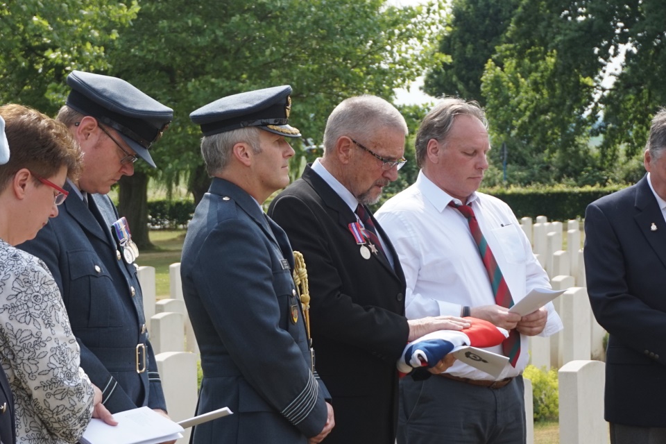 (left to right) Flt Lt Adam Jux, RAF Association; Group Captain Roland Smith, Defence Attaché; Nigel Reed, son of Flt Sgt Reed; and Gary Reed, nephew of Flt Sgt Reed (Crown Copyright) All rights reserved