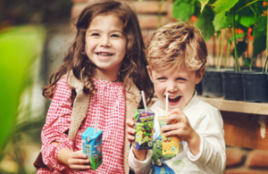Children drinking Appy Food and Drinks products