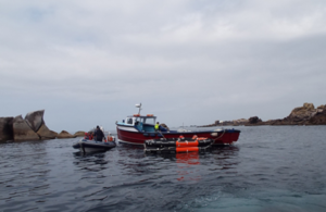 Photograph of the domestic passenger vessel Surprise after the evacuation