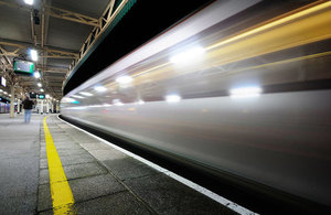 Train passing through a railway station.