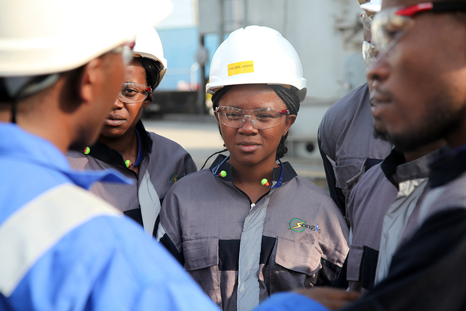Workers at a power plant in Tanzania that has benefited from UK investment. Picture: CDC