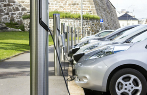 Row of electric cars charging